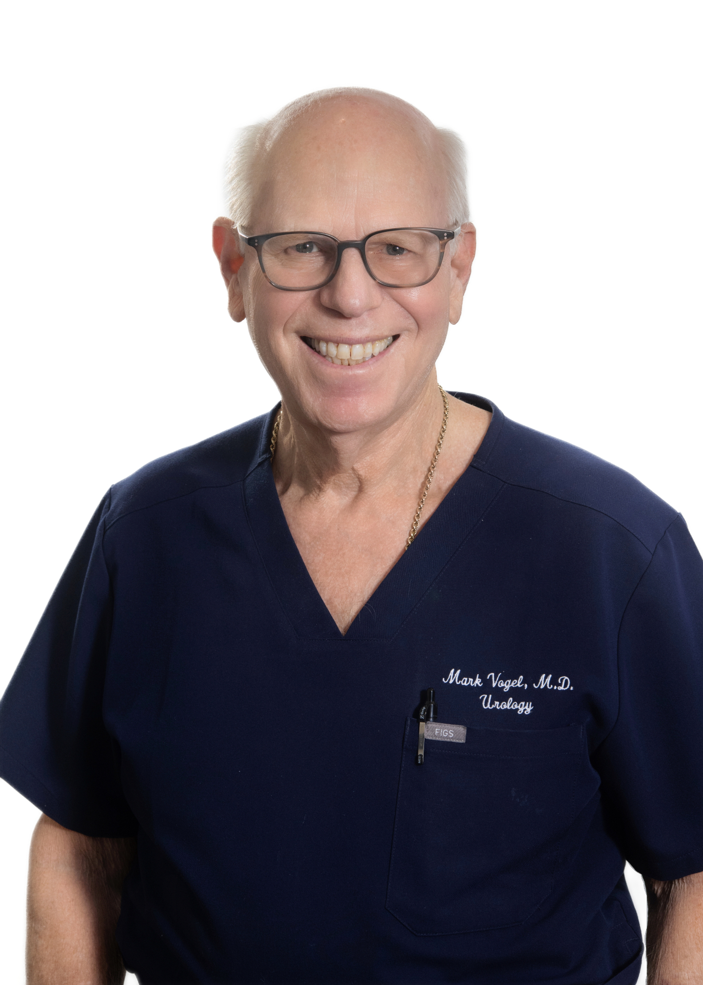 Portrait of Dr. Mark Vogel, MD in navy scrubs